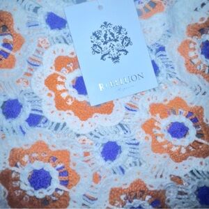 Rebellion Again crochet knit square sweater in white with purple & orange